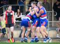 North Bendigo celebrates one of Jordan Ford's six goals against White Hills on Saturday. Picture by Darren Howe