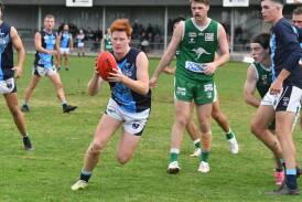 Eaglehawk's Sam O'Shannessy weaves through the pack at Dower Park. Picture by Adam Bourke