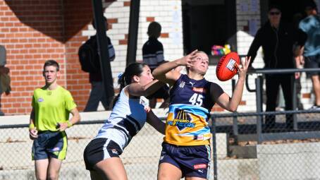 Bendigo Pioneer Alexis Gregor juggles a mark against the Northern Knights on Sunday. Picture by Enzo Tomasiello