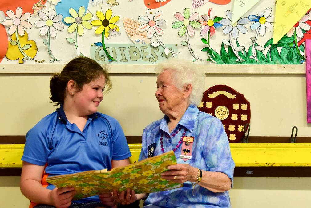Guide Bella Gill and Scouts and Guides ex-commissioner Murial Thornton at the Girl Guides 100th Anniversary celebration on Sunday. Picture by Brendan McCarthy