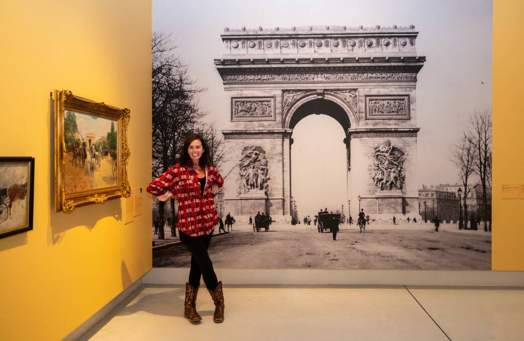 Rachael Leighton enjoys the Paris exhibition at the Bendigo Art Gallery. Picture by Enzo Tomasiello