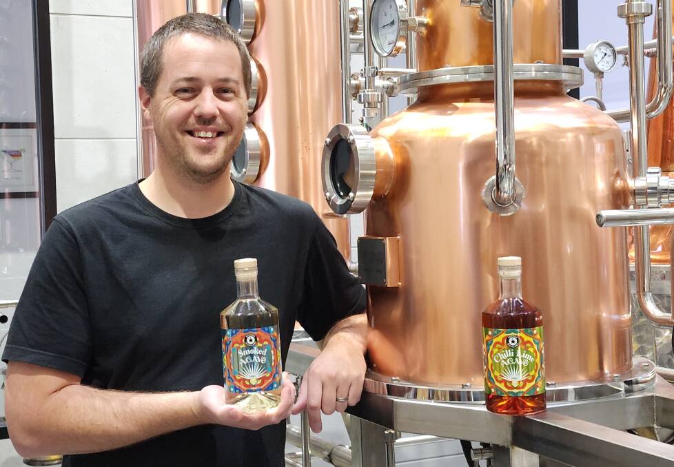 Echuca Distillery head distiller Peter De Vries with his two gold medal winning Agave spirits. Supplied picture.