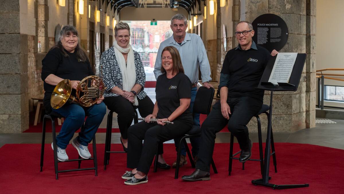 Cathy Moore (BSO), Carolyn Stanford (Ulumbarra Foundation), Michael McKern, Nigel McGuckian (BSO president) and (front) Cynthia Holsworth (BSO) with the new chairs and music stand. Picture by Bill Conroy