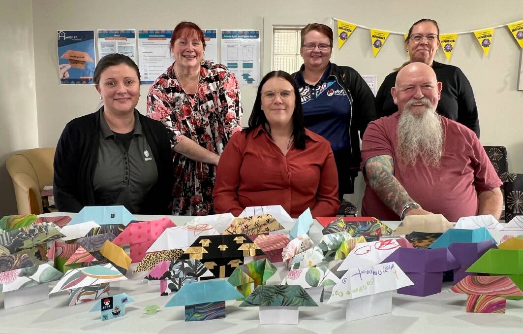 Maryborough and District Health Services create origami houses to highlight the housing crisis in Victoria.