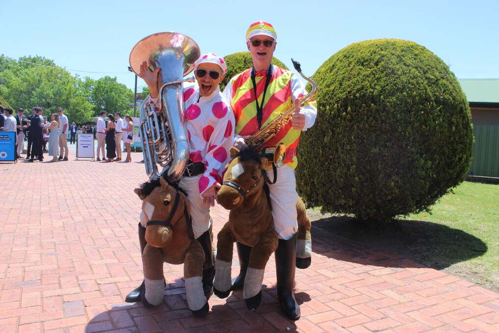 'Giddy Up', aka Nick Yates and Luke Farrugia, were greeting racegoers as they arrived at the track with some upbeat jazz numbers. Pictures by Jenny Denton