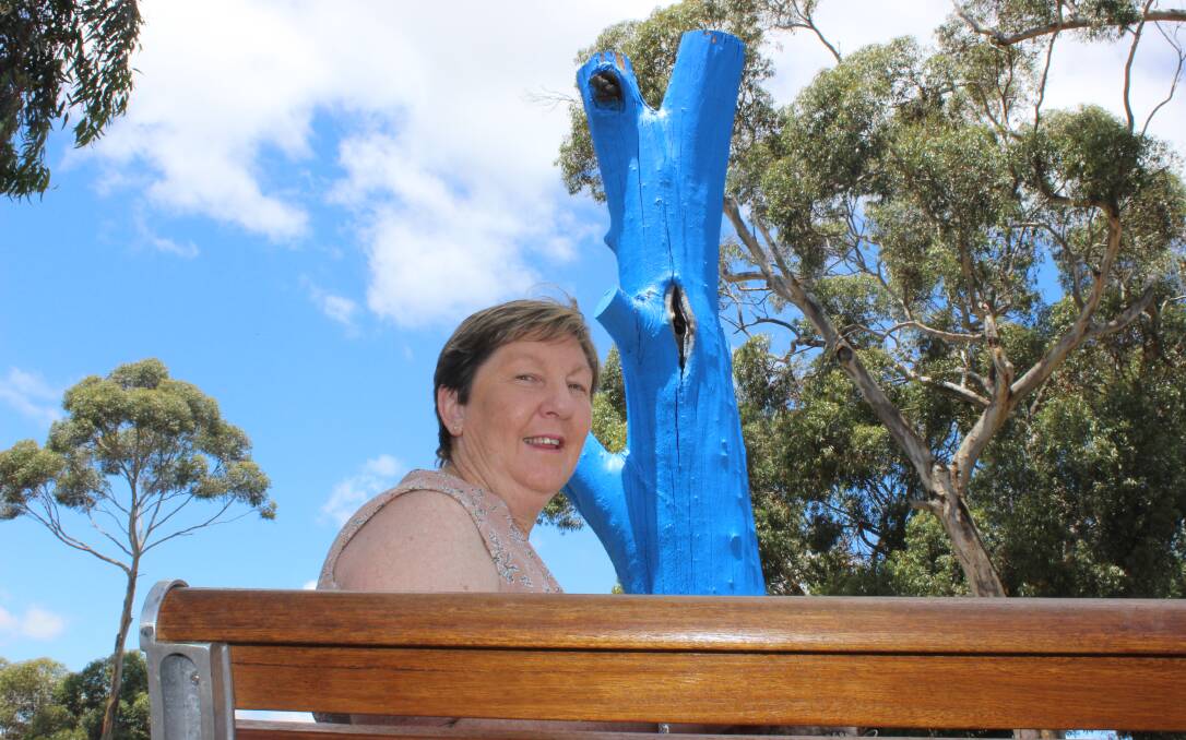 Alannah McGregor sits by the blue tree at Lake Neangar. Picture by Jenny Denton