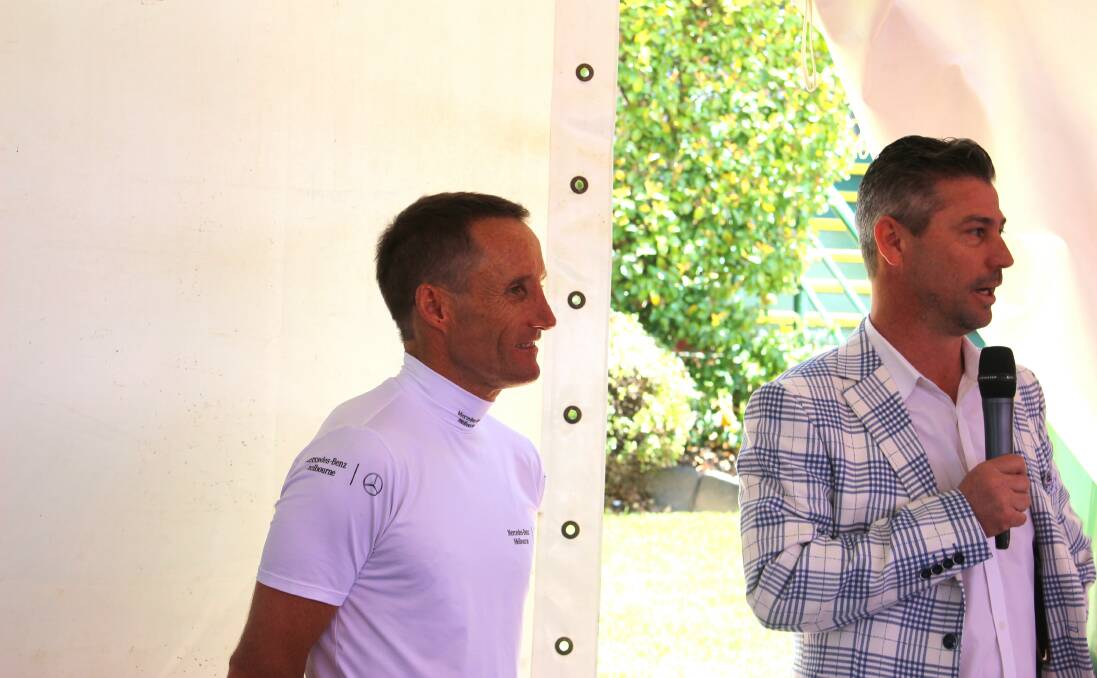 Retiring jockey Damien Oliver with local trainer and emcee Brent Stanley. Picture by Jenny Denton