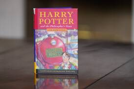 The pristine first edition hardback of JK Rowling's Harry Potter and the Philosopher's Stone, one of only 500 produced in the first print run in 1997. Picture by Jacob King/PA Wire