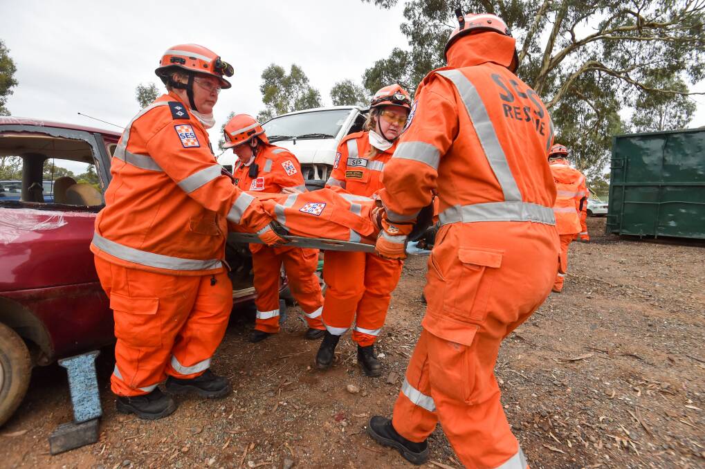 Female Loddon Mallee VICSES volunteers undertaking a simulated road crash rescue. Picture by Darren Howe