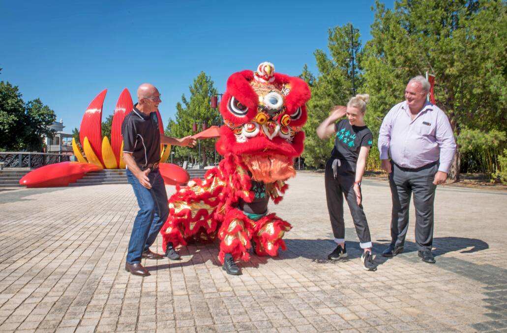 President of Bendigo Chinese Association, Doug Lougoon, Ji the lion, assistant secretary Ashlee Lougoon, and CEO of Golden Dragon Museum Hugo Leschen. Picture by Brendan McCarthy