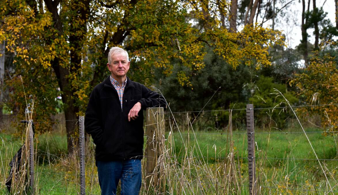 Strathfieldsaye resident Dennis Johanson says he wants to see the City of Greater Bendigo purchase vacant land and turn it into an open park. Picture by Brendan McCarthy