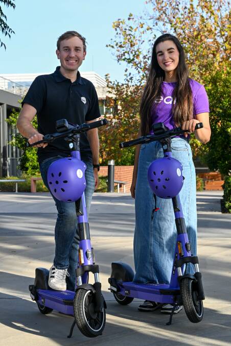 Beam Mobility's Ned Dale and Erin Leavey at La Trobe University for the launch of Bendigo's e-scooter trial. Picture by Enzo Tomasiello