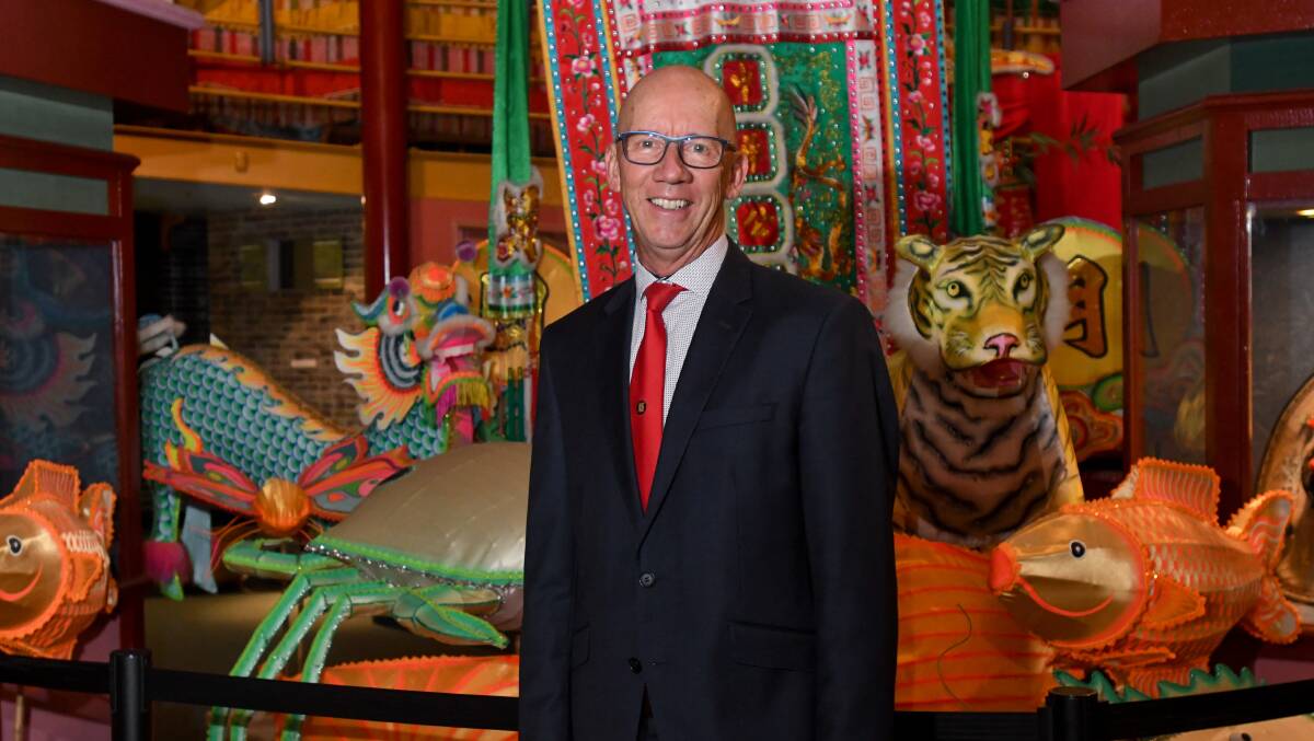 Bendigo Chinese Association president Doug Lagoon with some of the new items to be displayed in the Gala Parade 2023. Pictures by Noni Hyett