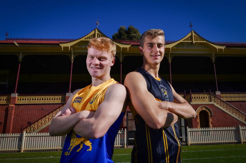 BSSC's Jesse Gill (left) and CMC's Deakin Andrews can't wait for the biggest Bendigo school footy game on the calendar. Picture by Darren Howe