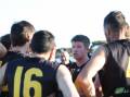 Tigers coach Bryce Delmenico addresses his team at the three-quarter time huddle. Picture by Blake Lee
