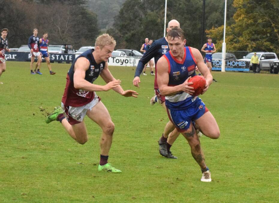 Arguably the two best players in the BFNL Gisborne's Brad Bernacki (right) and Lachlan Tardrew going hammer and tong on Saturday. Picture by Kieran Iles. 