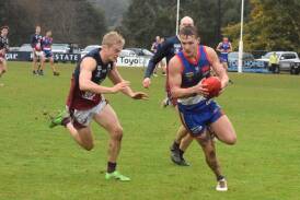 Arguably the two best players in the BFNL Gisborne's Brad Bernacki (right) and Lachlan Tardrew going hammer and tong on Saturday. Picture by Kieran Iles. 