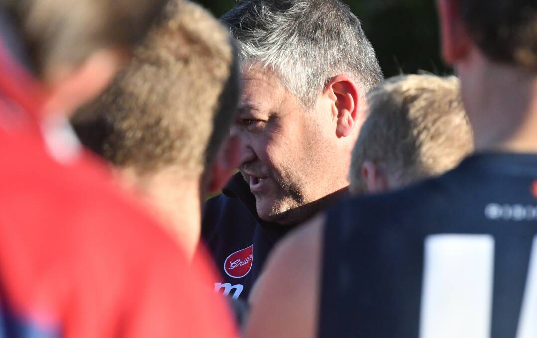 Sandhurst co-coach Ashley Connick adressing his players. Picture by Adam Bourke