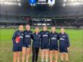 Pioneers Vic Country representatives and coach Whitney Kennedy in the centre of Marvel Stadium on Sunday. Picture by La Trobe University Bendigo Pioneers Facebook Page