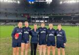 Pioneers Vic Country representatives and coach Whitney Kennedy in the centre of Marvel Stadium on Sunday. Picture by La Trobe University Bendigo Pioneers Facebook Page
