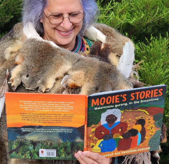 Aunty Ros Kneebone-Dodson with her book 'Mooie's Stories' (supplied).