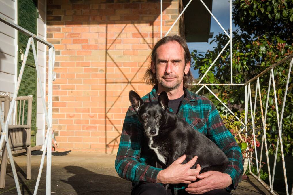 Chris said simple things - like walks with his dog Jet - helped him navigate perinatal mental health struggles. Picture by Brendan McCarthy 