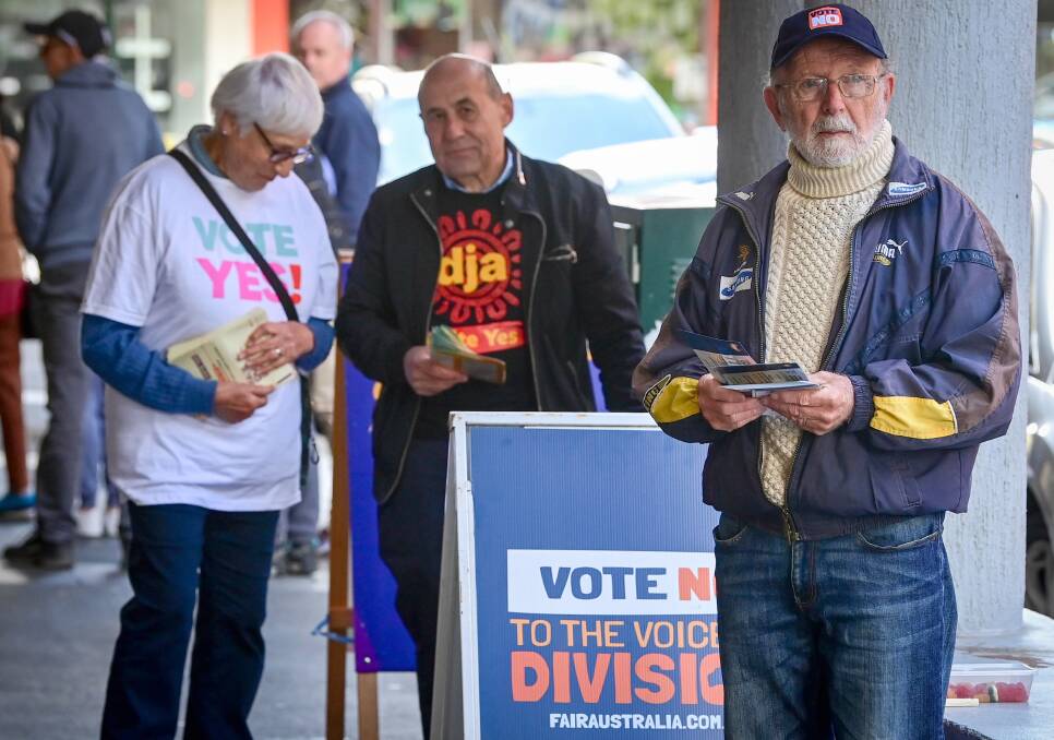 Members of the public handing out flyers for the referendum vote. Picture by Brendan McCarthy.