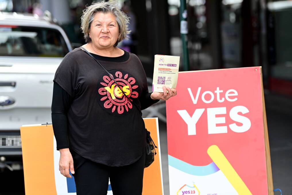 Yes campaigners lined the street outside the early voting centre. Picture by Brendan McCarthy.