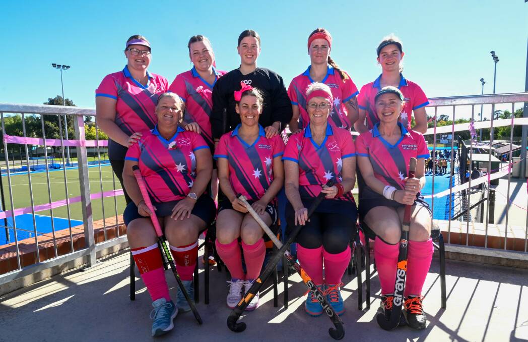 The four mums and five daughters which made up the Maryborough Hockey team for the women and girls round. Picture by Enzo Tomasiello.