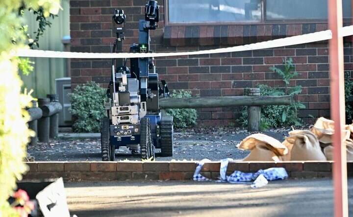 Two tactical robots appeared to be used in the operation. Picture by Darren Howe.