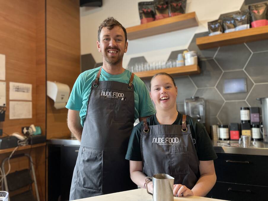 Mollie Allen with her favourite co-worker at the Nude Food Breakfast Bar Angus Doyle. Picture Ben Loughran.