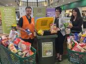 (From left) Woolworths assistant store manager Nick Davies, Bendigo Marketplace manager Danielle Tait and Bendigo Foodshare CEO Michelle Murphy at the Winter Food Drive launch on July 25. 