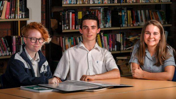 Templestowe College students Stevie, Liam and Melanie are doing the unscored VCE and will finish without an ATAR. Photo: Eddie Jim