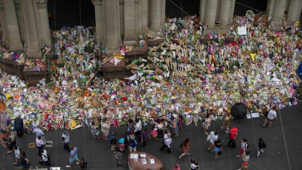 The makeshift floral memorial commemorating the lives of the victims of the Bourke Street attack. Photo: Jason South