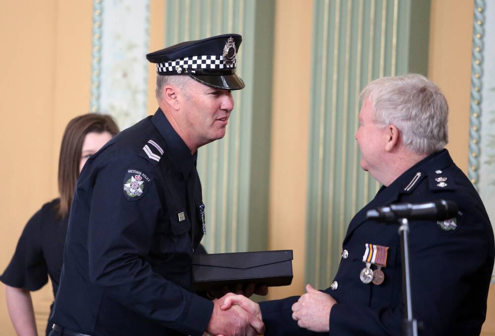 Maryborough Leading Senior Constable David Scott receives the Andrew Steel Staff Welfare Award. Picture: GLENN DANIELS