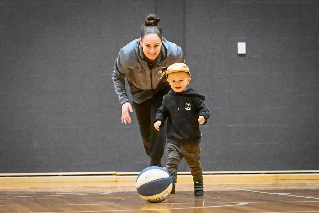 Kelly Wilson and son Ted, 2, enjoy some fun this week ahead of Saturday night's NBL1 south women's grand final. Picture by Darren Howe