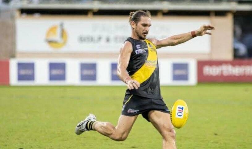 Cameron Illet, pictured playing for Nightcliff in the NTFL, is a big inclusion for Calivil United in this Saturday's LVFNL game against Inglewood.