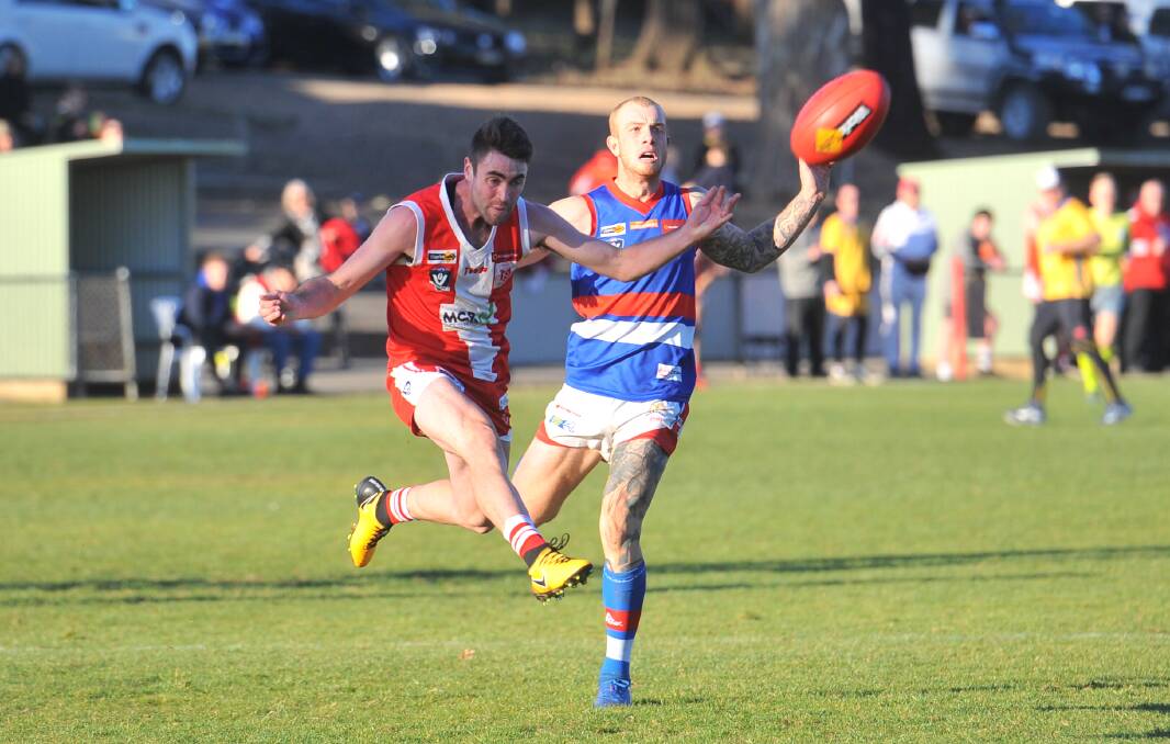 FULL FLIGHT: South Bendigo's Mitch Hocking boots a goal in third quarter against Gisborne at Harry Trott Oval on Saturday. Picture: LUKE WEST