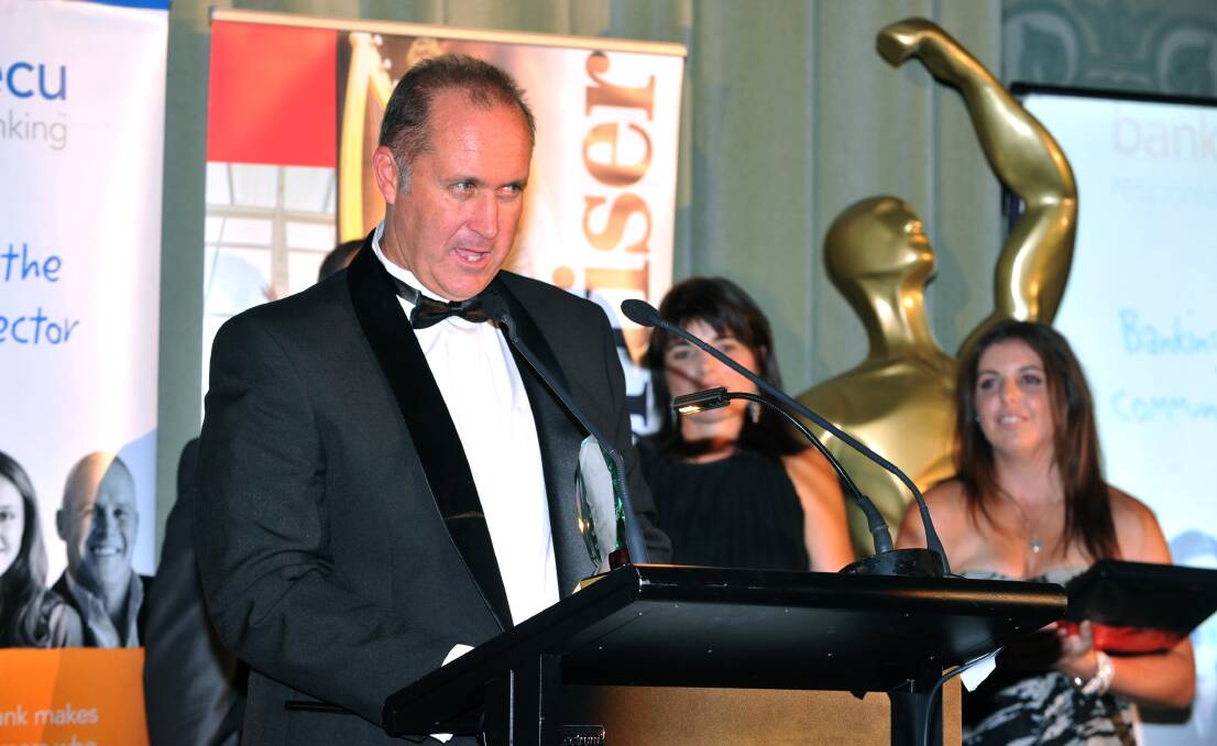 Danny Ellis after being named the Sports Focus Administrator of the Year in 2012.