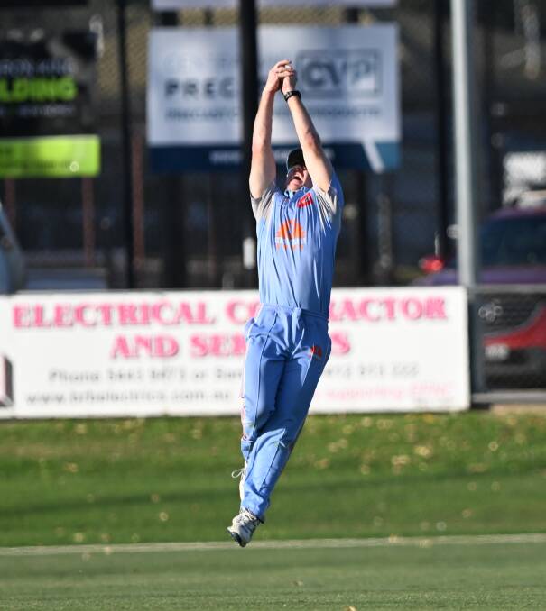 Strathdale-Maristians' captain Daniel Clohesy takes one of his two catches. Picture by Enzo Tomasiello