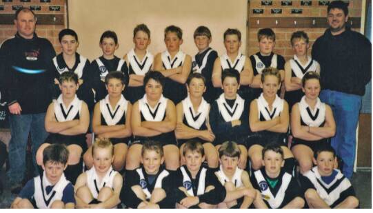 A Campbells Creek under-12s team in the early 2000s. Martin is pictured in the middle of the second row. Picture Campbells Creek FNC.