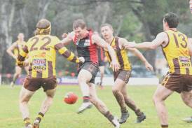 Ryan Walker, who was one of White Hills' best players, gets a kick away against Huntly in the wet at Scott Street on Saturday. Picture by Adam Bourke