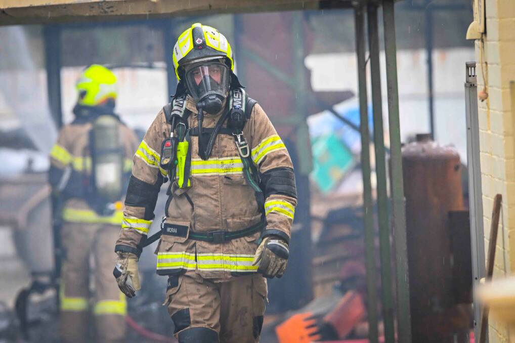 A firefighter at the scene of the White Hills shed blaze. Picture by Darren Howe