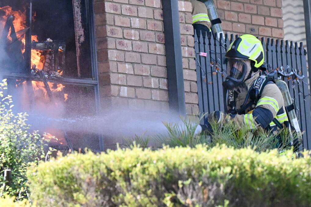 Firefighters put out a fire at a unit in Kangaroo Flat on Friday (June 27) afternoon. Pictures by Darren Howe
