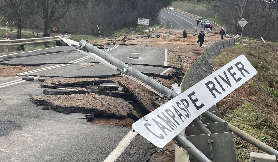 The McIvor Highway at the Axedale bridge was destroyed by flooding in one example of the damage councils and other levels of government have been grappling with. Picture by Chris Pedler.