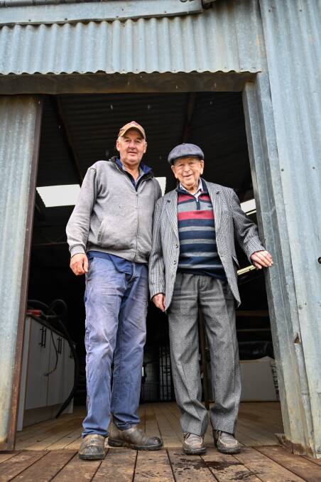 Peter Collins, with his dad Phil. "It's not just about Angus, it's all about breeding good stock." Picture by Enzo Tomasiello
