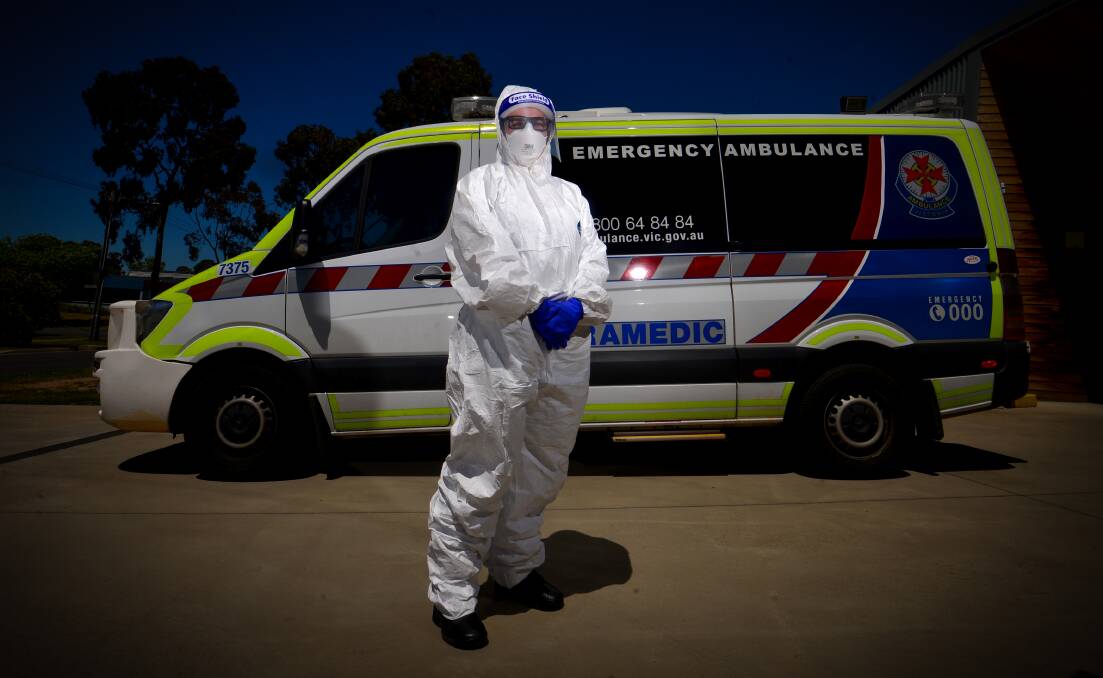 Eaglehawk Ambulance Victoria paramedic Kim Baker in full PPE. File picture by DARREN HOWE