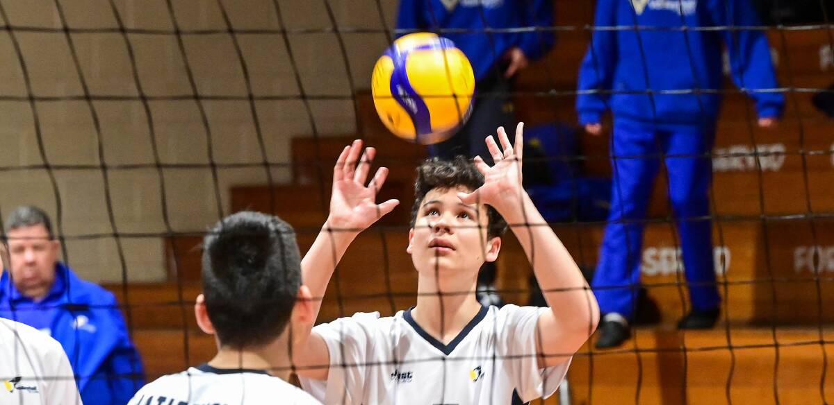 Bendigo's Ben Lim sets up a shot for his Victorian team-mate during the 2-1 (25-15, 25-20) win over Tasmania on Wednesday. Picture by Brendan McCarthy