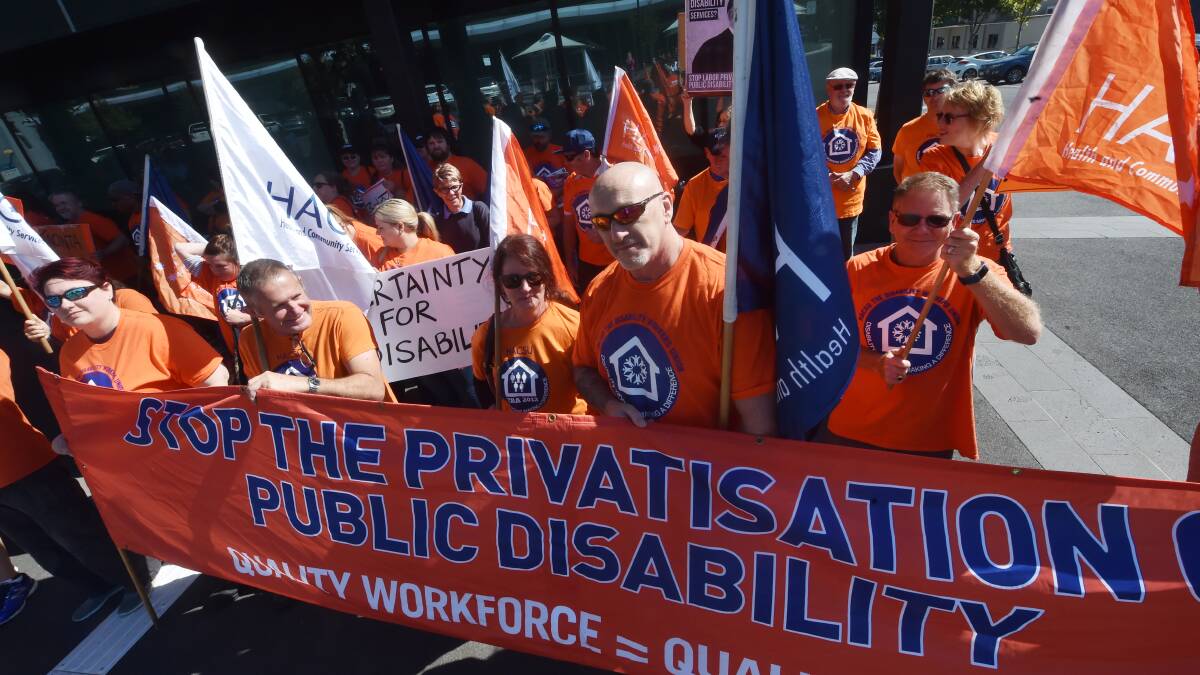 UNHAPPY: Disability services workers and the Health and Community Services Union protest against privatisation at a rally in Bendigo in April. Picture: DARREN HOWE