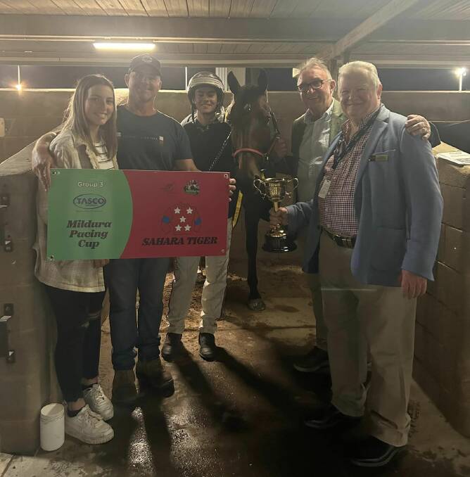 Abby Sanderson, trainer Shane Sanderson, driver Ryan Sanderson and part-owners Dale Monteith and Peter Watkinson with Mildura Pacing Cup winner Sahara Tiger. 
